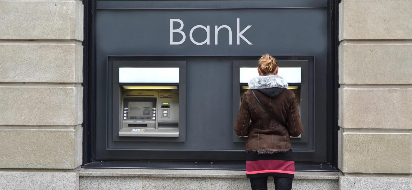 Woman at an ATM