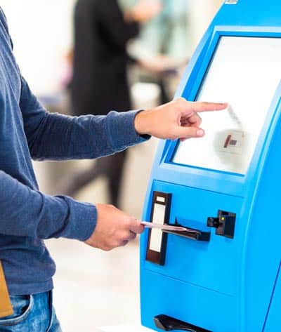 Boarding pass issuance at a kiosk.