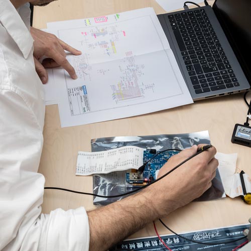 Engineer working on a ticket printer